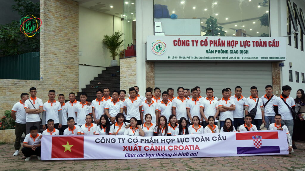 Workers receiving last-minute guidance and support before flying to their European job destinations