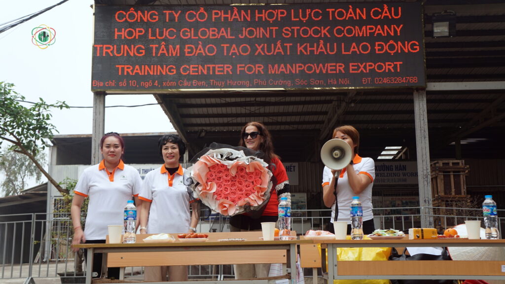 Team leaders and hospitality expert gathering for a group photo at the training program’s closing event
