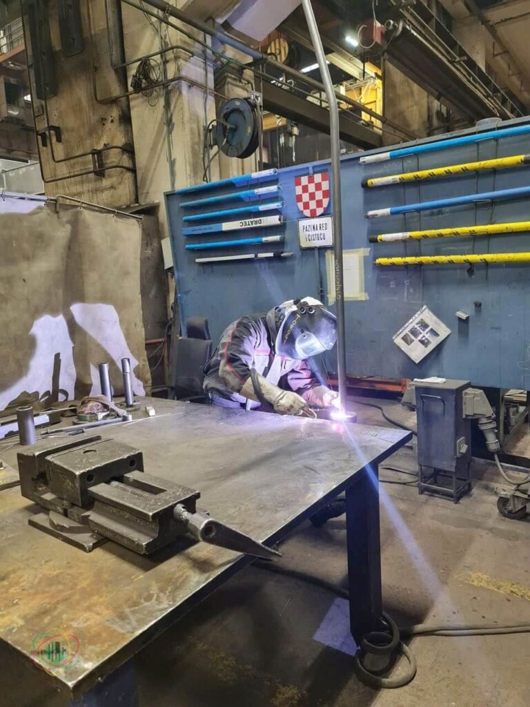 Vietnamese manufacturing workers in European factory supported by Vietnam manpower services