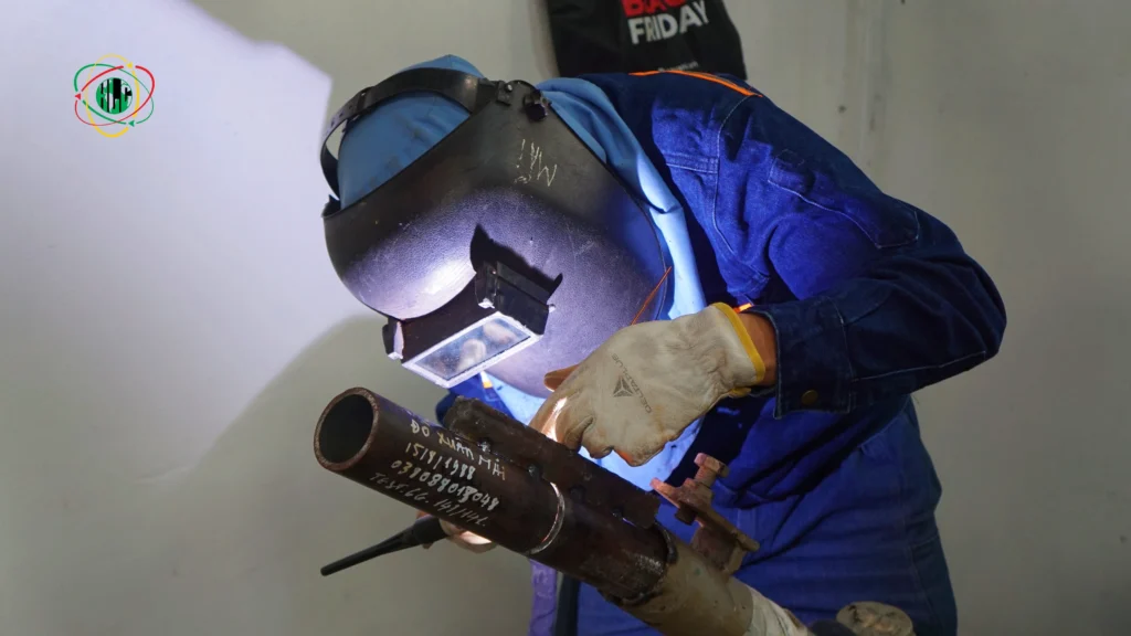 Skilled Vietnamese workers training in a manufacturing environment for European job placements