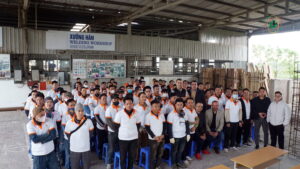 European employer poses with candidates for mechanical and construction job orders at Hop Luc Training Center